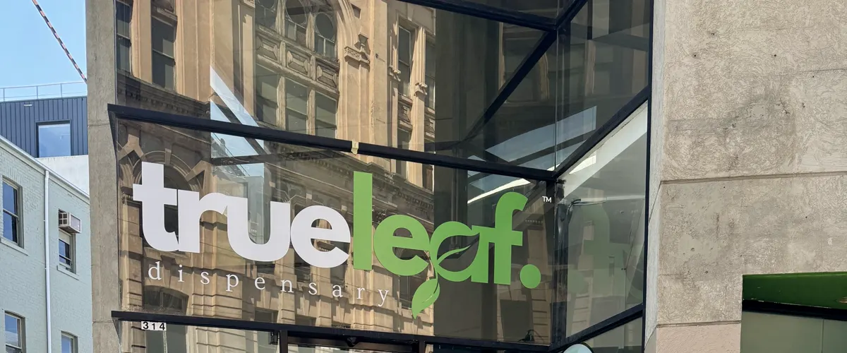 The trueleaf dispensary sign above the shopfront on Chapel Street